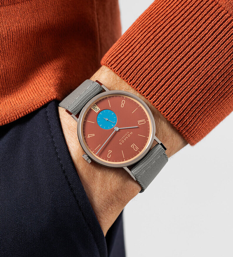 nomos tangente ziegelblau wristshot