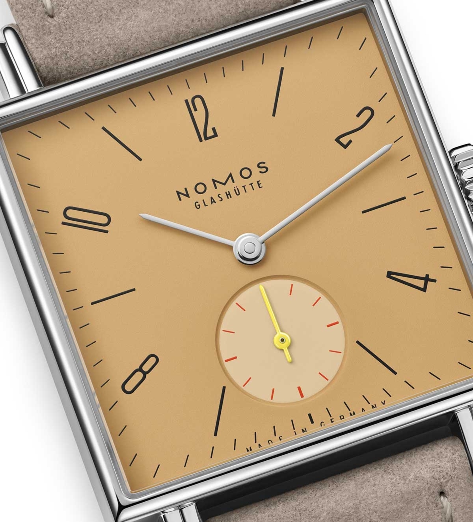 nomos tetra ochra dial