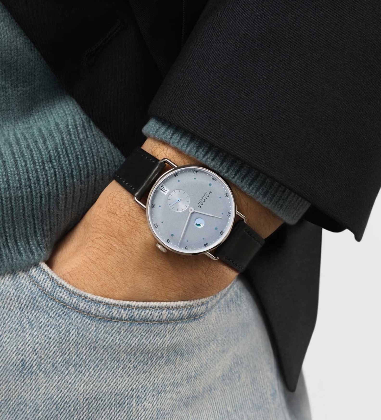 nomos metro date power reserve ice blue wristshot